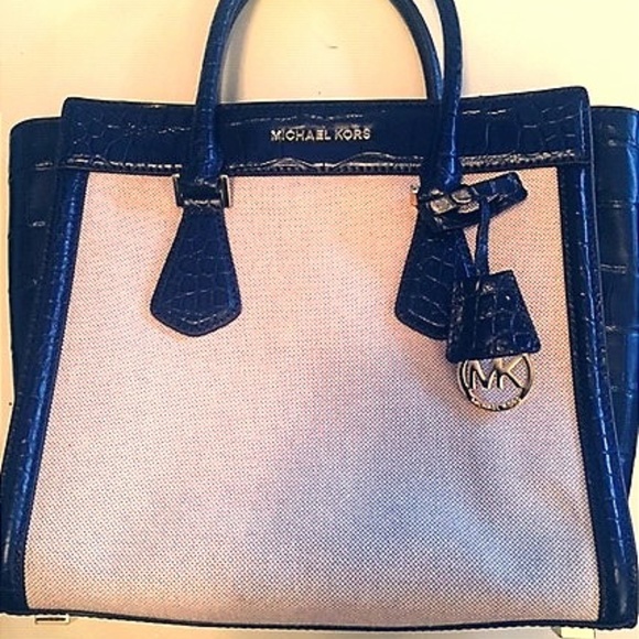 navy and cream handbags